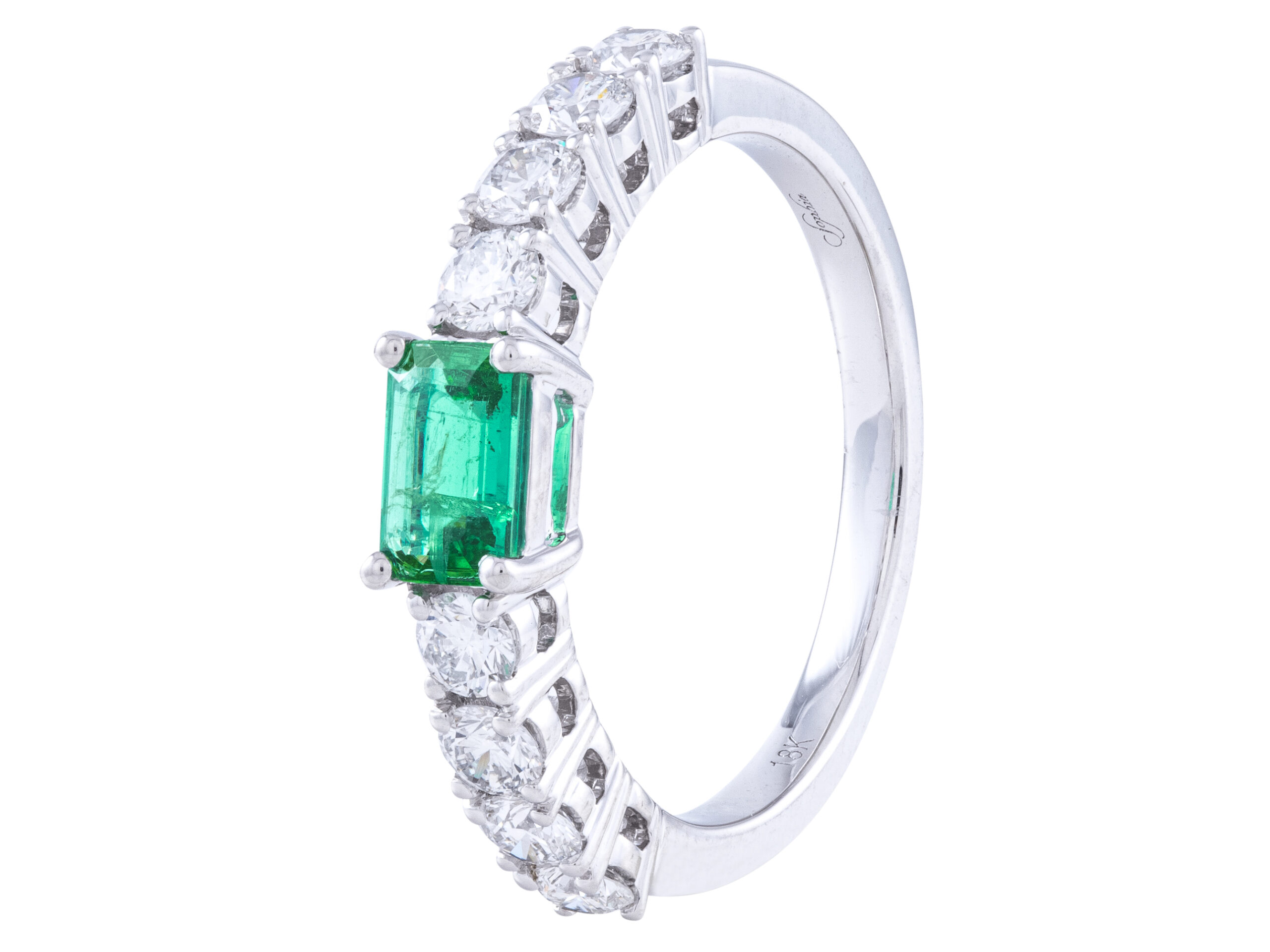 Emerald and diamond white gold ring