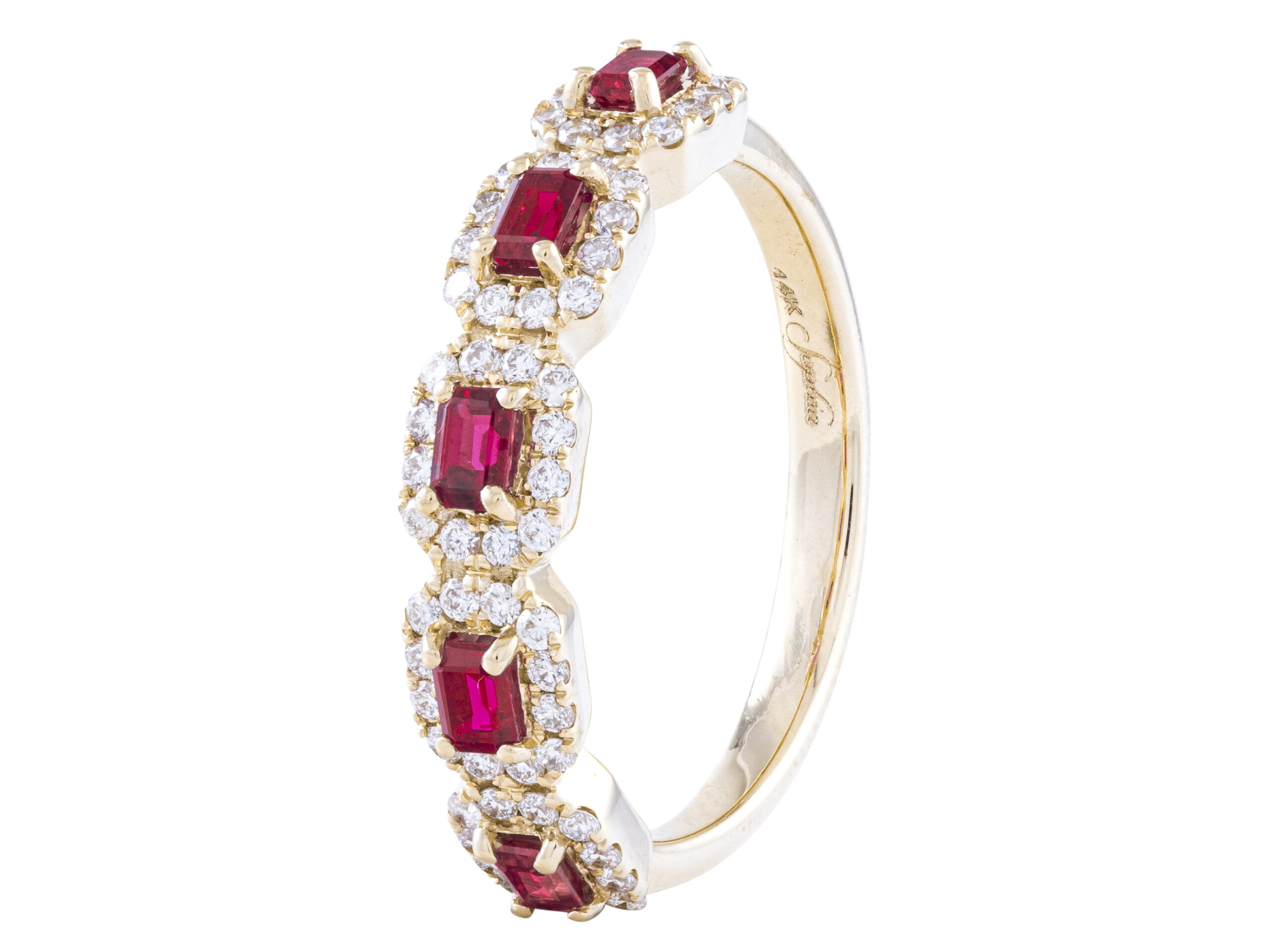 Gold ring with red and white gemstones