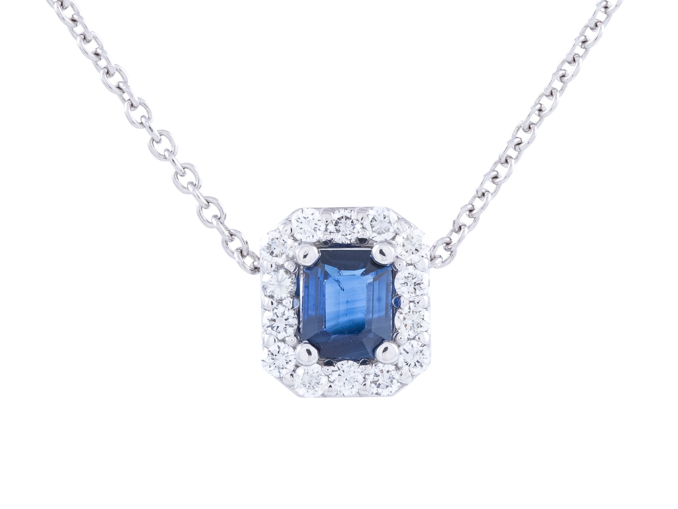 Sapphire pendant with diamond halo on chain necklace