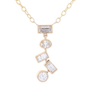 Gold necklace with geometric diamond pendant design.
