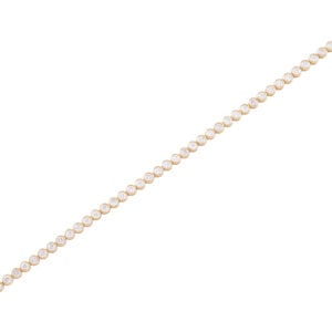 Gold diamond tennis bracelet on white background.