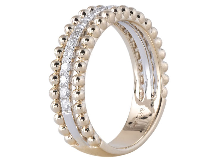 Gold ring with diamonds on a white background.