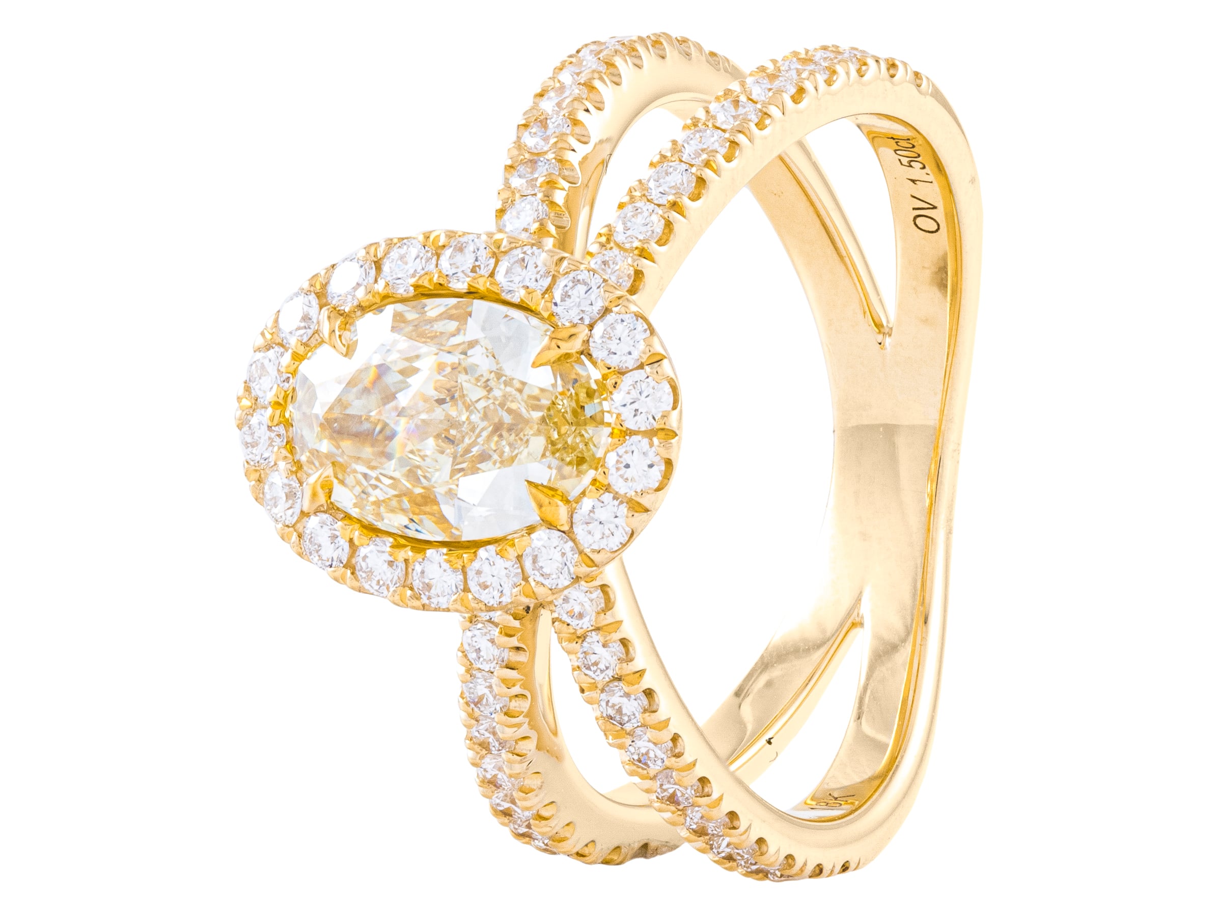 Gold ring with oval diamond and halo design.
