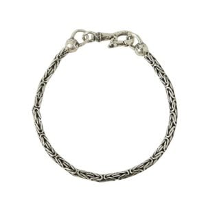 Intricate silver chain bracelet with clasp.