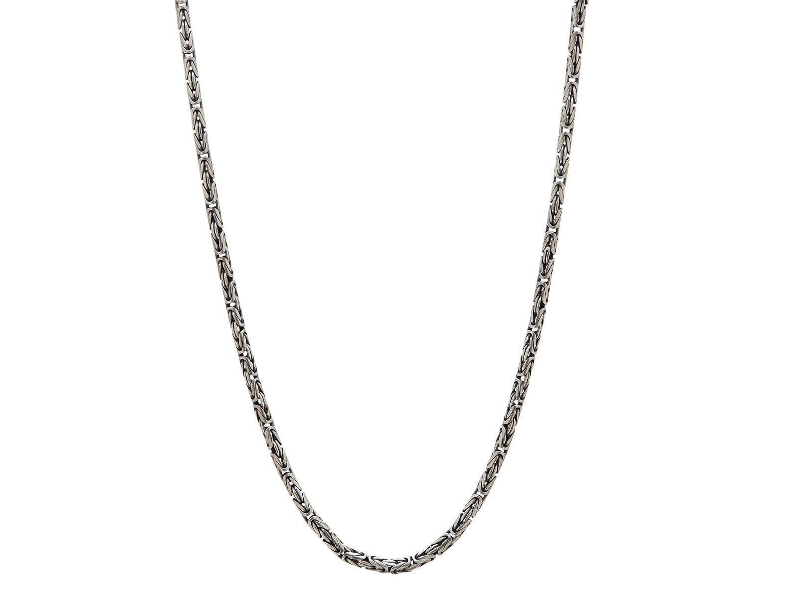 Silver chain necklace with intricate design