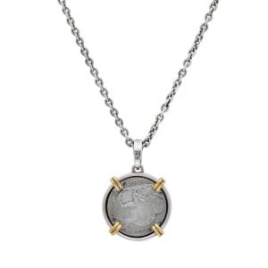 Silver chain necklace with vintage coin pendant.