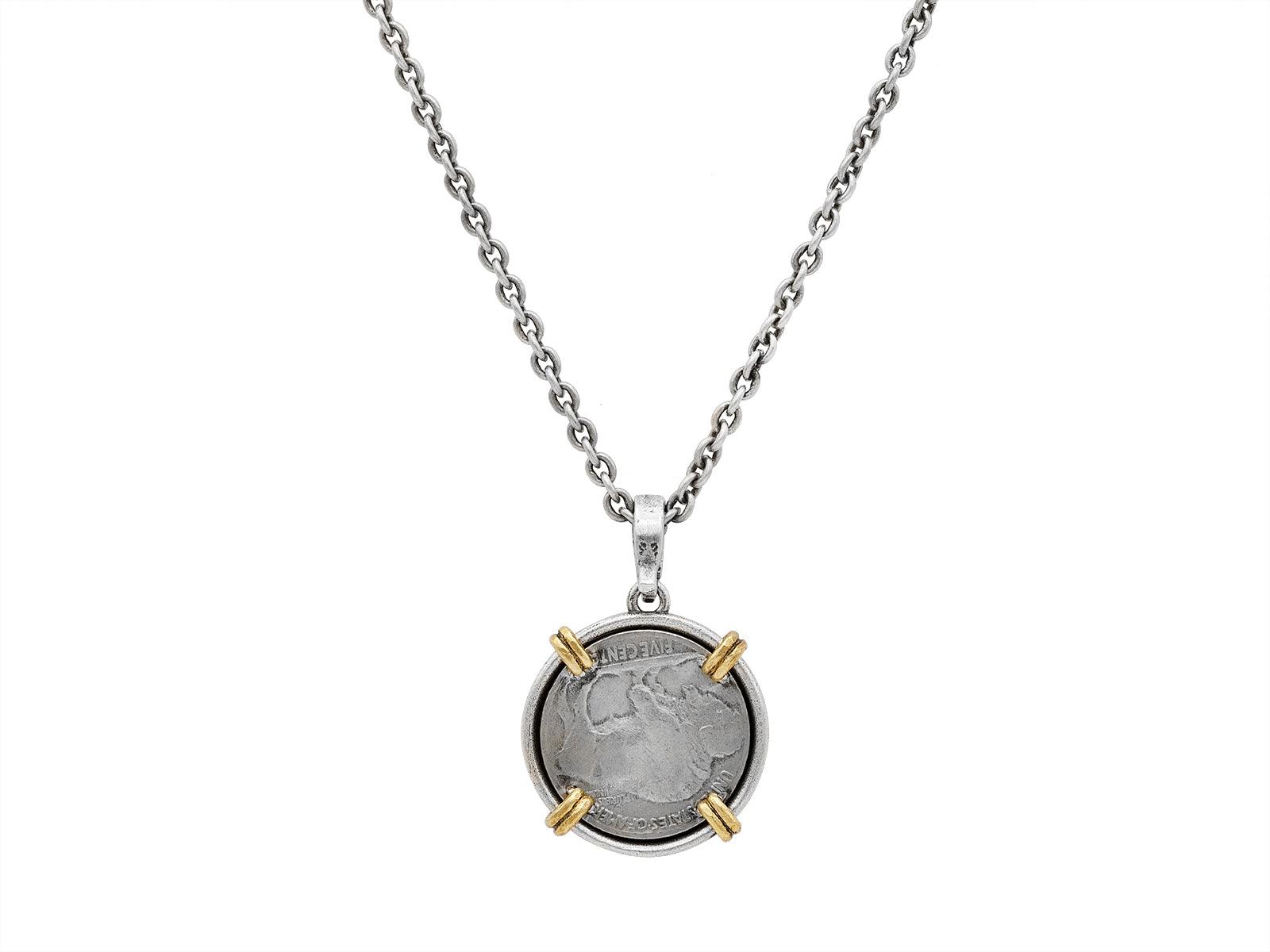 Silver chain necklace with vintage coin pendant.