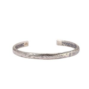 Textured silver cuff bracelet with engravings