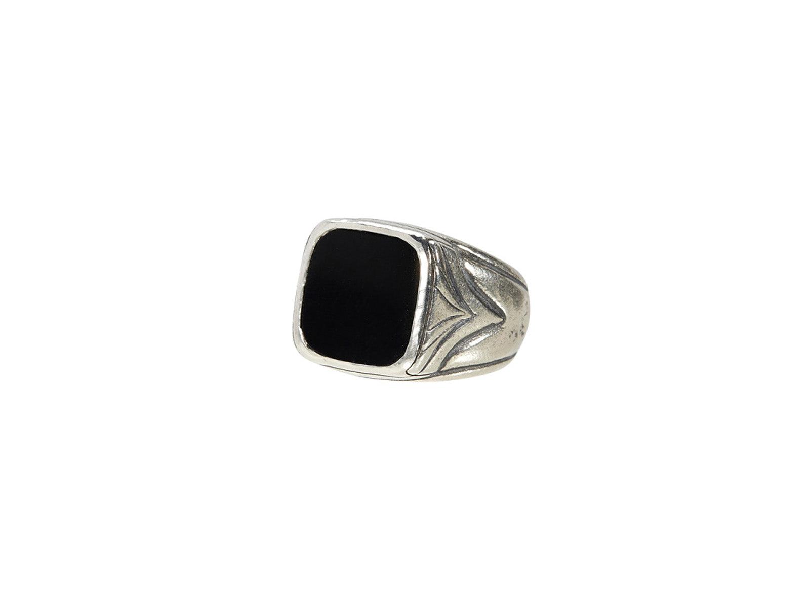 Silver ring with black stone design