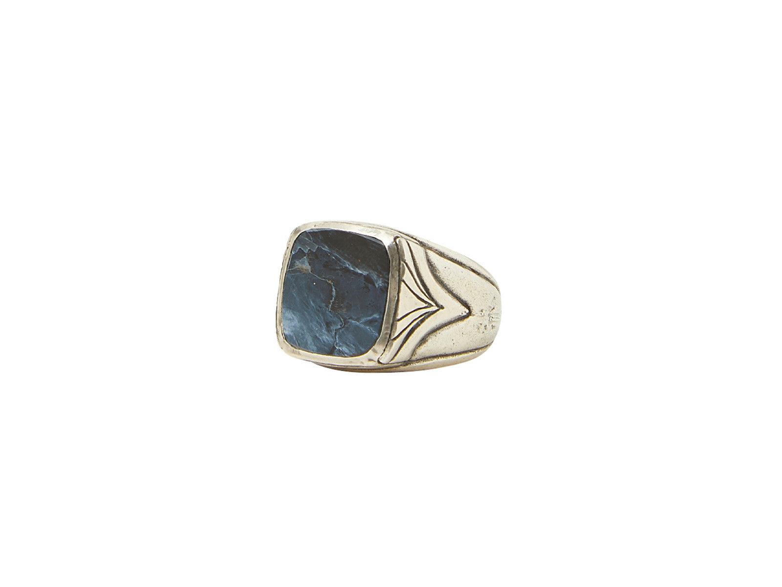 Silver ring with blue gemstone