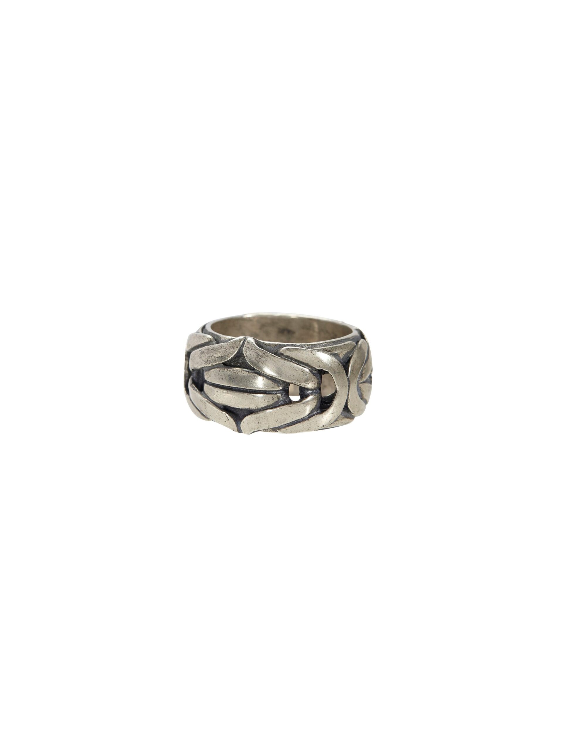 Silver ring with intricate braided design