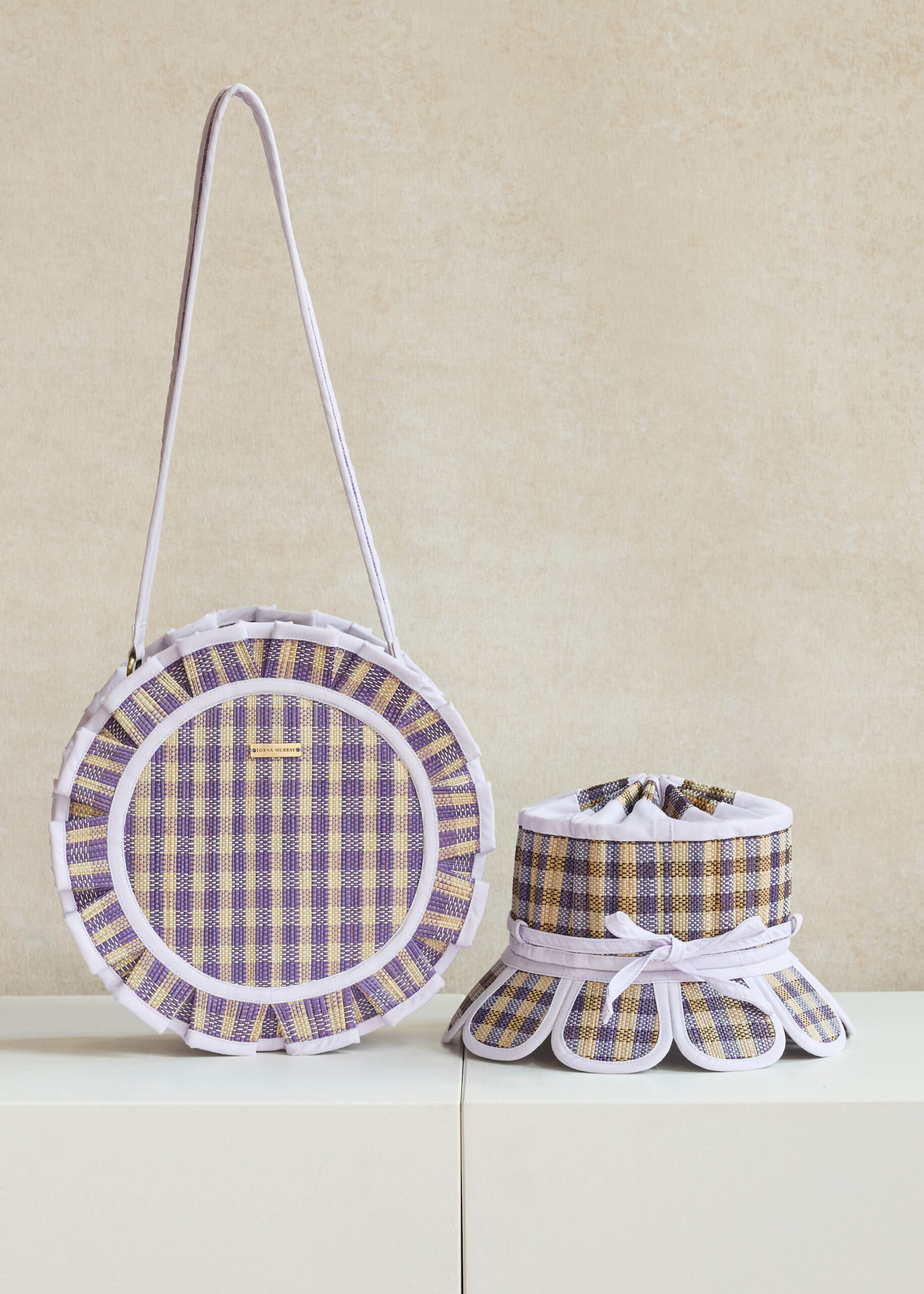 Plaid-patterned round bag and matching bucket hat