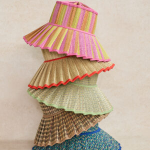 Stack of colorful woven hats