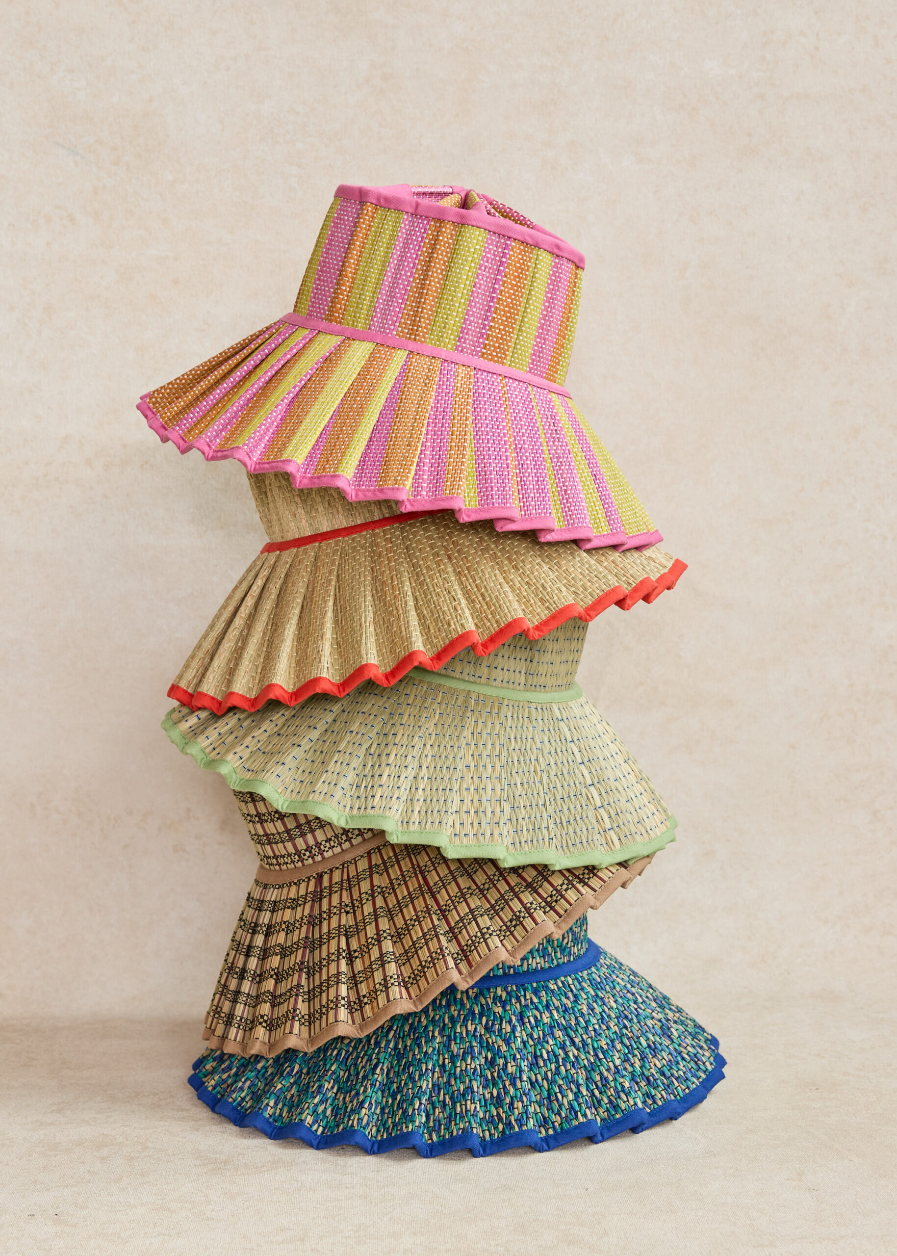 Stack of colorful woven hats