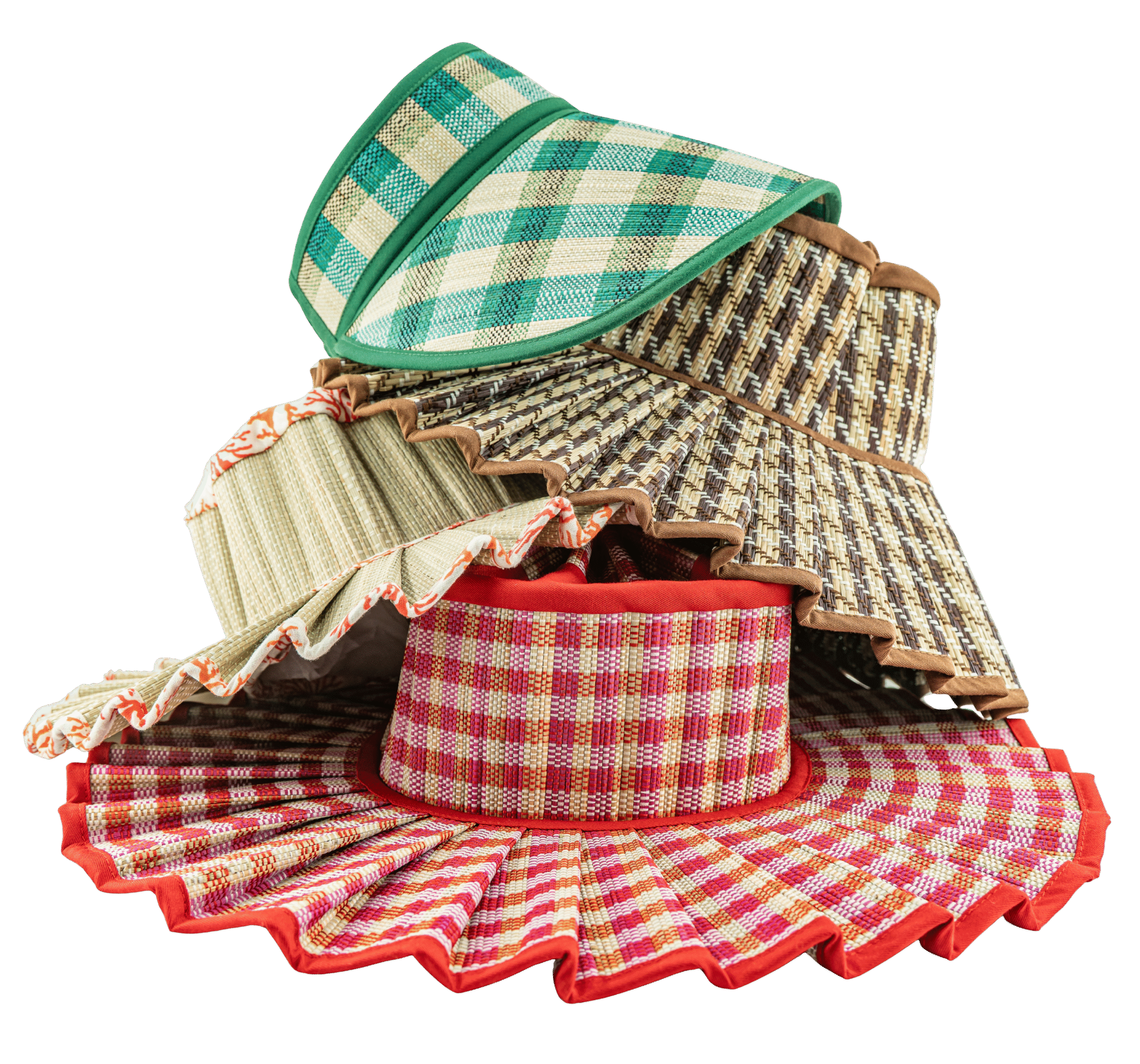 Stack of colorful, striped hats on black background.